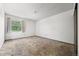 This bedroom has carpet, a window and white walls at 2742 S Xanadu Way, Aurora, CO 80014