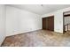 Bedroom with carpet, closet, and window at 2742 S Xanadu Way, Aurora, CO 80014