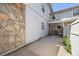 Exterior shot showcasing the home's siding, stone accents, and driveway leading to the front entrance at 2742 S Xanadu Way, Aurora, CO 80014