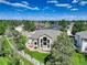 Aerial view of a home with a backyard and green space and trees at 14075 Turnberry Ct, Broomfield, CO 80023