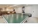 Finished basement featuring an exercise area and a comfortable lounge with sectional sofa at 14075 Turnberry Ct, Broomfield, CO 80023
