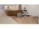 Finished basement featuring a cozy seating area, ping pong table, and a playful teepee tent at 14075 Turnberry Ct, Broomfield, CO 80023