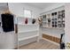 Walk-in closet with shelves, storage, and an organizing system at 14075 Turnberry Ct, Broomfield, CO 80023