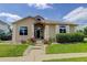Beautiful single-story home with a well-maintained lawn, flower beds and inviting entrance at 14075 Turnberry Ct, Broomfield, CO 80023