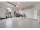 Spacious two-car garage with workbench, tools, storage and plenty of workspace at 14075 Turnberry Ct, Broomfield, CO 80023