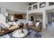 Spacious living room features an open floor plan, vaulted ceilings, and abundant natural light at 14075 Turnberry Ct, Broomfield, CO 80023