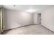 Spacious basement area with carpet and an adjacent closet at 5421 S Vivian St, Littleton, CO 80127