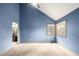 Bright bedroom with vaulted ceilings and attached bathroom at 5421 S Vivian St, Littleton, CO 80127