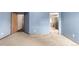 Bedroom entrance into en suite bathroom with glass enclosed shower at 5421 S Vivian St, Littleton, CO 80127