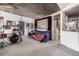 Finished basement featuring carpeted floors, comfortable furniture, and creative decorative touches at 17706 Cherokee St, Broomfield, CO 80023