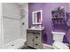 Eclectic bathroom with purple walls, modern fixtures, and a unique design aesthetic at 17706 Cherokee St, Broomfield, CO 80023