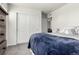 Cozy bedroom with neutral walls, plush carpet, and a large closet with sliding doors at 17706 Cherokee St, Broomfield, CO 80023