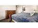 This spacious main bedroom features a dresser and an ensuite bathroom at 17706 Cherokee St, Broomfield, CO 80023