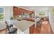 Bright eat-in kitchen featuring stainless steel appliances, granite countertops and wood cabinets at 22485 Laurel Oak Dr, Parker, CO 80138