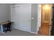 Bedroom with a closet and a nearby desk for a functional and organized space at 4680 Copeland Loop # 203, Highlands Ranch, CO 80126