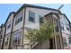 Well-maintained exterior of the home with plenty of windows offering natural light, plus a staircase at 4680 Copeland Loop # 203, Highlands Ranch, CO 80126