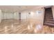 Spacious finished basement offers wood floors, recessed lighting, and ample storage at 5857 S Logan Ct, Centennial, CO 80121