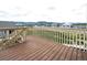 Spacious wooden deck with scenic mountain views, perfect for relaxing and entertaining outdoors at 16858 Greyhawk Dr, Monument, CO 80132
