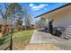 Well-maintained backyard with a patio area and lush greenery, ideal for outdoor living at 13905 W 21St Ave, Golden, CO 80401