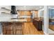 Spacious kitchen featuring stainless steel appliances, a breakfast bar, and plenty of natural light at 13905 W 21St Ave, Golden, CO 80401