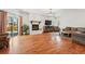 Spacious living room boasts hardwood floors, a fireplace, and plenty of natural light at 13905 W 21St Ave, Golden, CO 80401
