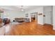 Spacious living room boasting hardwood floors, an overhead light fixture, and large windows at 13905 W 21St Ave, Golden, CO 80401