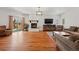 Bright living room boasts hardwood floors, a fireplace, and plenty of natural light at 13905 W 21St Ave, Golden, CO 80401