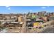High aerial view of an urban city street, buildings and a busy intersection with cars at 2318 Arapahoe St, Denver, CO 80205