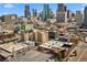 A vibrant urban neighborhood with a mix of historic buildings and modern skyscrapers at 2318 Arapahoe St, Denver, CO 80205