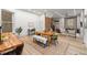 Open-concept living area features a spacious dining room, living room, and staircase at 2318 Arapahoe St, Denver, CO 80205