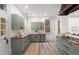 Well-lit kitchen with shaker style cabinets, butcher block countertops, and stainless steel appliances at 2318 Arapahoe St, Denver, CO 80205