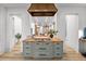 Charming kitchen island with gas cooktop and sleek grey cabinetry at 2318 Arapahoe St, Denver, CO 80205
