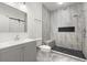 Modern bathroom featuring marble floors, tiled shower with a built-in bench, and sleek fixtures at 400 Division Blvd, Platteville, CO 80651