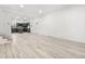 The living area features recessed lighting, hardwood floors and an open layout at 400 Division Blvd, Platteville, CO 80651