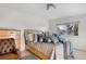 Comfortable bedroom with a large bed, dresser, and a window for natural light at 977 S Salida St, Aurora, CO 80017