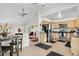 Open concept layout with stainless steel appliances, wood cabinets, and a connected dining area at 977 S Salida St, Aurora, CO 80017