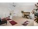 Inviting living room with a stone fireplace, vaulted ceilings, and lots of natural light at 977 S Salida St, Aurora, CO 80017