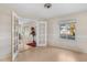 Bright and airy living room featuring beautiful French doors, wood floors, and lots of natural light at 977 S Salida St, Aurora, CO 80017