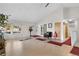 Spacious living room with vaulted ceilings, a fireplace, and lots of natural light from large windows at 977 S Salida St, Aurora, CO 80017