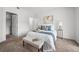 Neutral bedroom with a comfortable bed, soft carpet, and a clean, minimalist style at 8603 E Dry Creek Rd # 214, Englewood, CO 80112