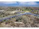 Aerial view of the property showcasing its location near parks, water, and local roadways at 9350 W Florida Ave, Lakewood, CO 80232