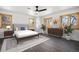 Charming bedroom with neutral colors, hardwood floors, and ample natural light creating a peaceful retreat at 9350 W Florida Ave, Lakewood, CO 80232