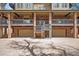 Spacious three-car garage with access stairs, integrated into the lower level of this unique home at 9350 W Florida Ave, Lakewood, CO 80232