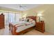 Comfortable bedroom featuring natural light and wood furnishings at 800 N Washington St # 307, Denver, CO 80203