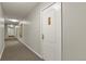 Long hallway featuring neutral colors and carpet leading to different rooms at 800 N Washington St # 307, Denver, CO 80203
