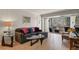 Comfortable living room with balcony, perfect for relaxing and entertaining at 800 N Washington St # 307, Denver, CO 80203