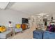 Inviting living room with modern furnishings and open floor plan flowing into kitchen at 800 N Washington St # 307, Denver, CO 80203