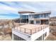 Luxury home with circular design and expansive deck at 1175 Ridge Oaks Dr, Castle Rock, CO 80104