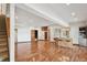 Spacious basement recreation area with hardwood floors and wet bar at 1175 Ridge Oaks Dr, Castle Rock, CO 80104
