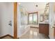 Relaxing bathroom with a large soaking tub and shower at 1175 Ridge Oaks Dr, Castle Rock, CO 80104